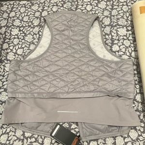 New with tags, size large Nike running vest!